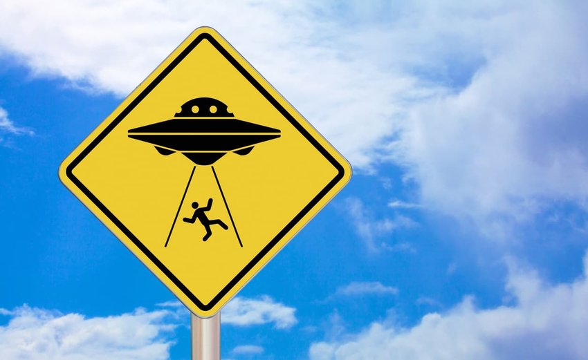 alien abduction crossing sign