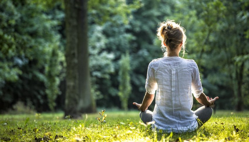 meditating in grass