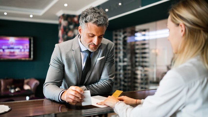 businessman at hotel reception