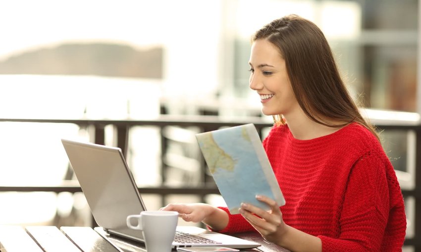 woman typing at laptop