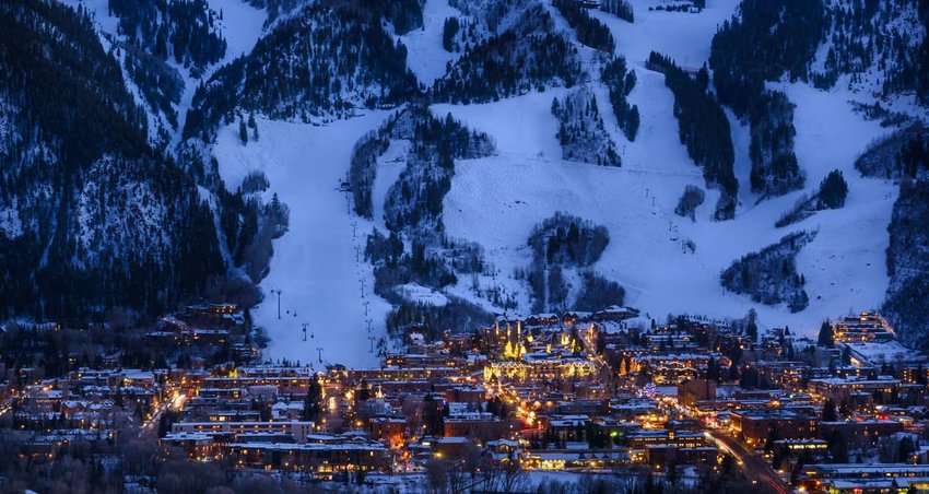 Aspen, Colorado Town and ski slopes at dusk