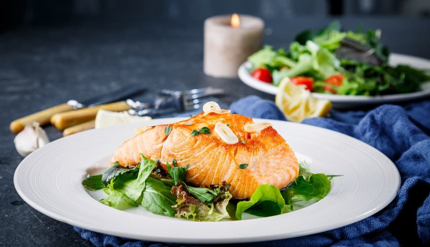 salmon served on white plate