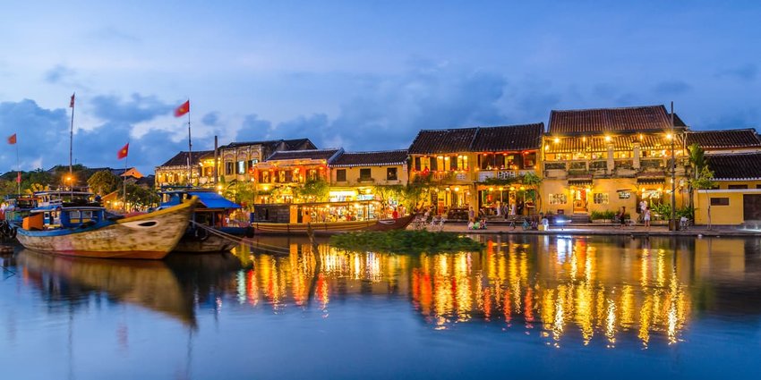 Hoi An reflected in the river during sunset