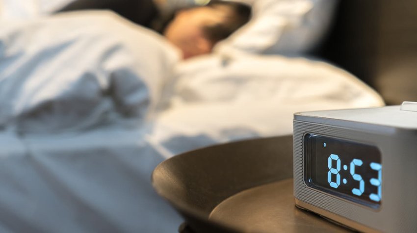 Alarm clock at bedside