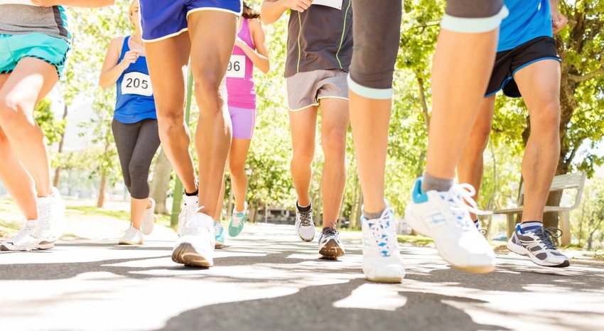 Marathon Runners Competing At Park