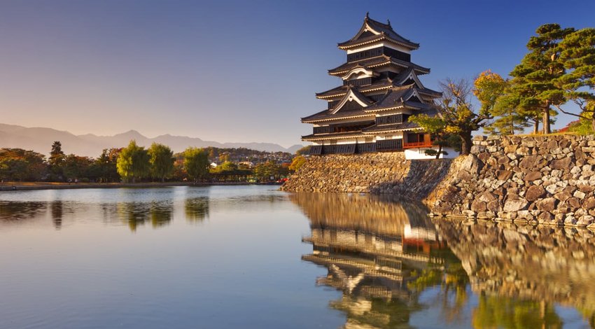 Matsumoto castle in Matsumoto, Japan at sunset