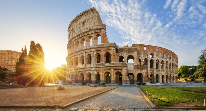 Colosseum in Rome and morning sun, Italy