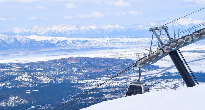 Gondola Peaking Up Over the Summit