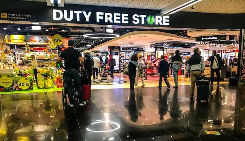 people shopping at duty free store in airport