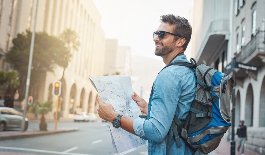 tourist man holding map