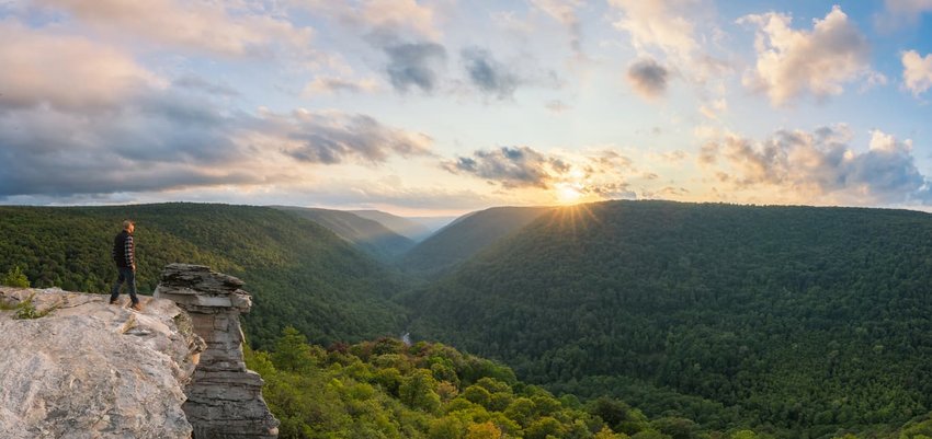 Hiker standing near a ledge at Lindy Point in West Virginia