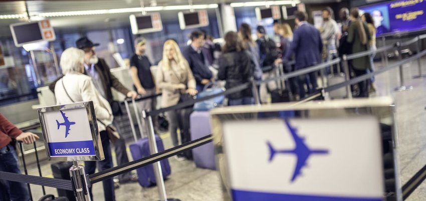 Airline passengers waiting in line