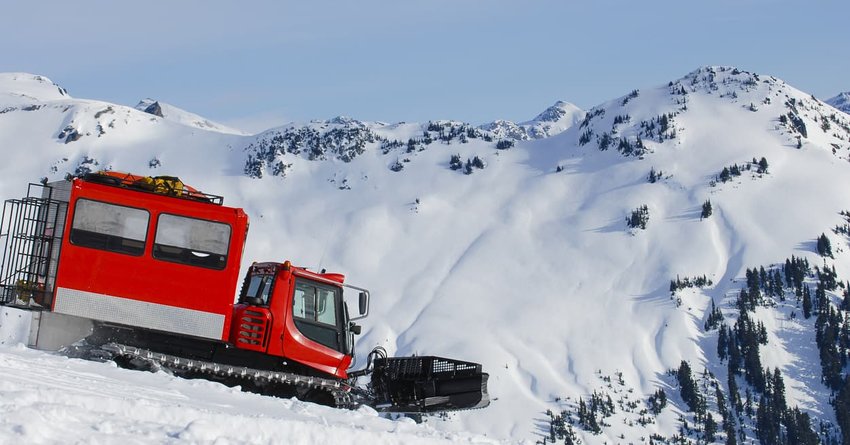 snowcat on snowy mountain