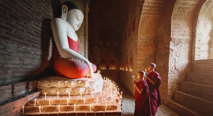 Praying Burmese Novice Monks in Stupa Temple Myanmar