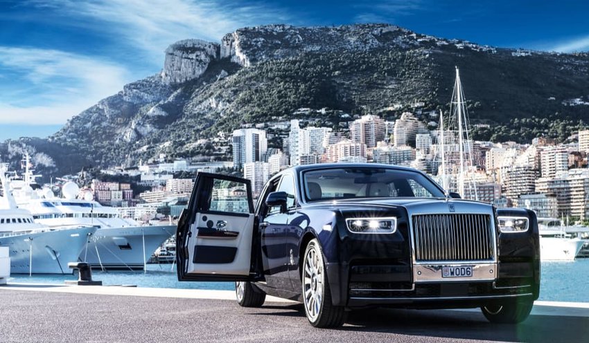 Royce Phantom VIII 8, in port with city and Yachts at background. Monte Carlo, monaco