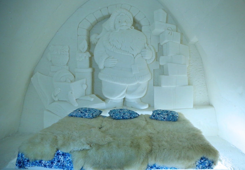 A carved ice wall above a suite in the Snow Castle hotel in Finland.