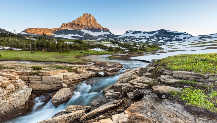 Photo of a river and mountain in Glacier National Park 