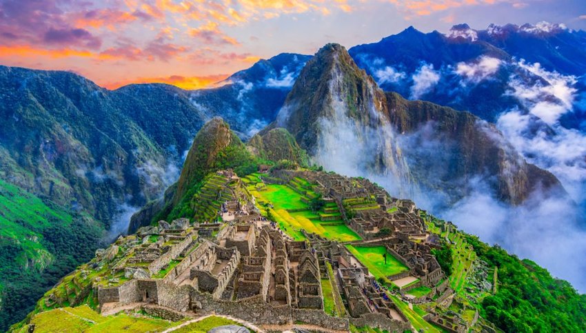 Colorful sky over Machu Picchu ruins