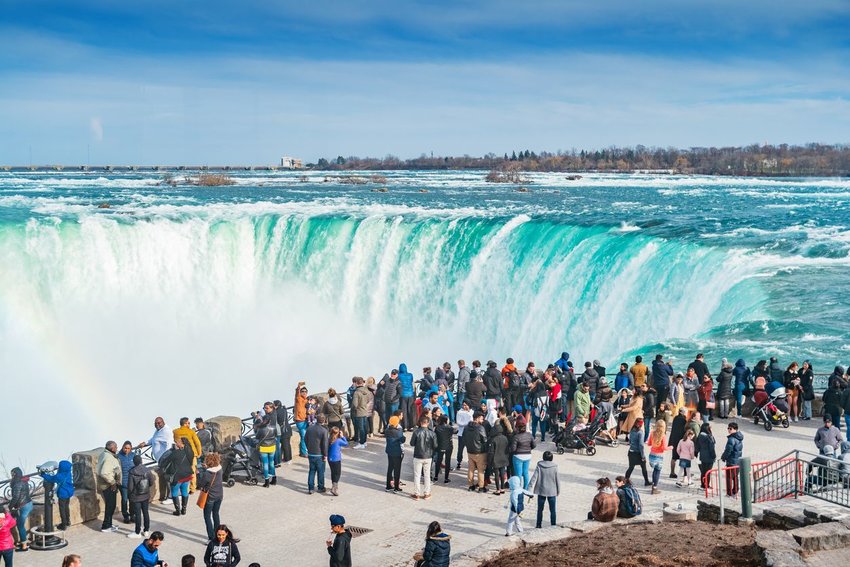 Photo of Niagara Falls and a crowd looking on