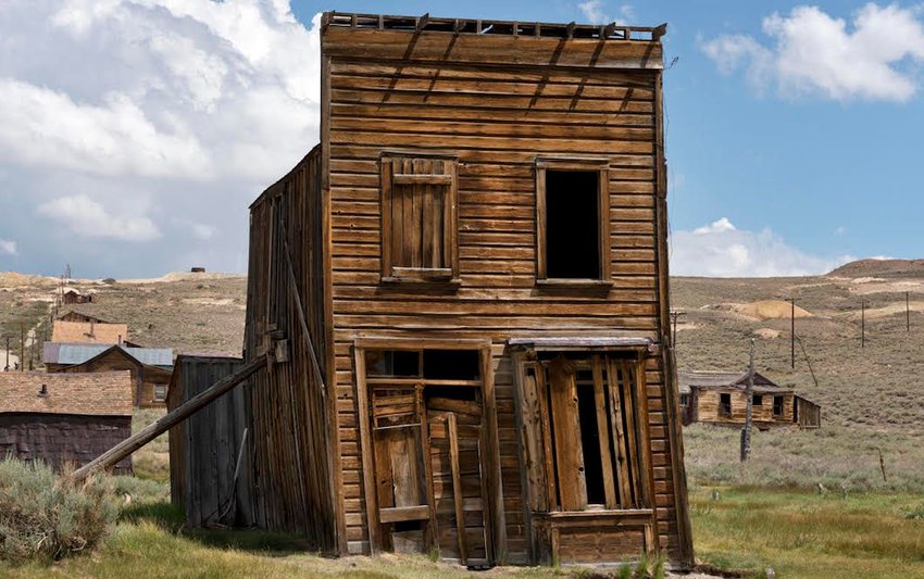 Photo of abandoned wooden building in Old West town