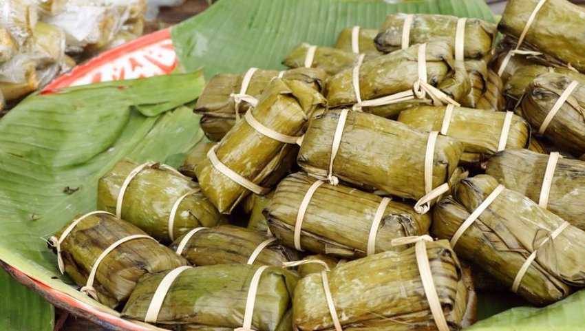 Sticky rice wrapped in banana leaves.