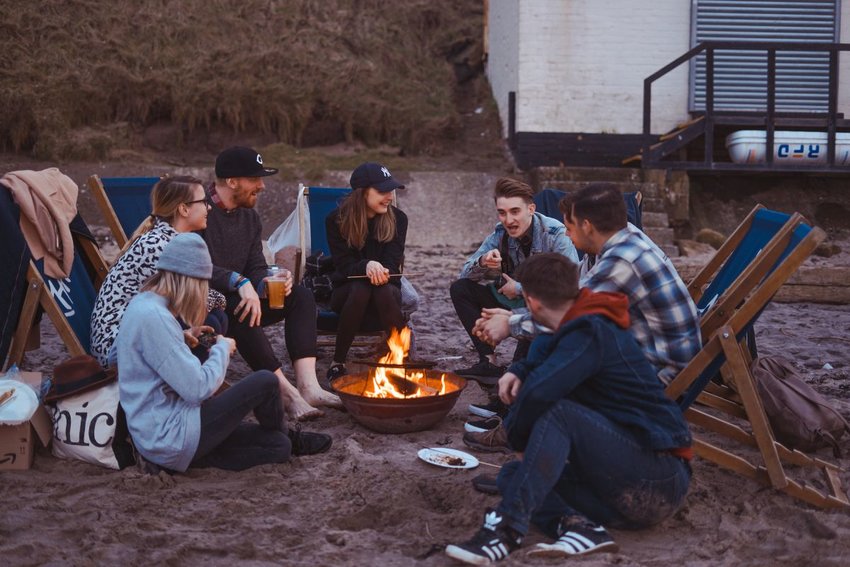 Friends around a bonfire