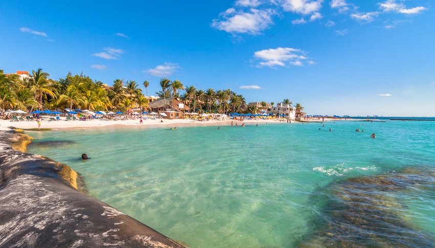 tourists on beach in Islas Mujeres