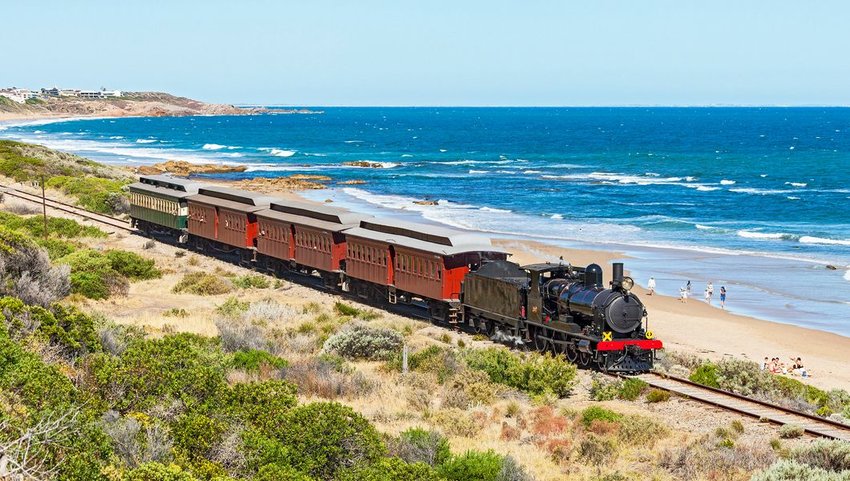 SteamRanger’s iconic steam-hauled Cockle Train passing by the beach, South Australia