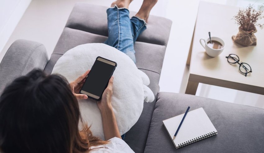 Woman relaxing on the couch at home