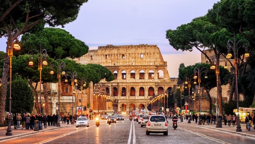 Traffic in street, Colosseum, Rome, Italy