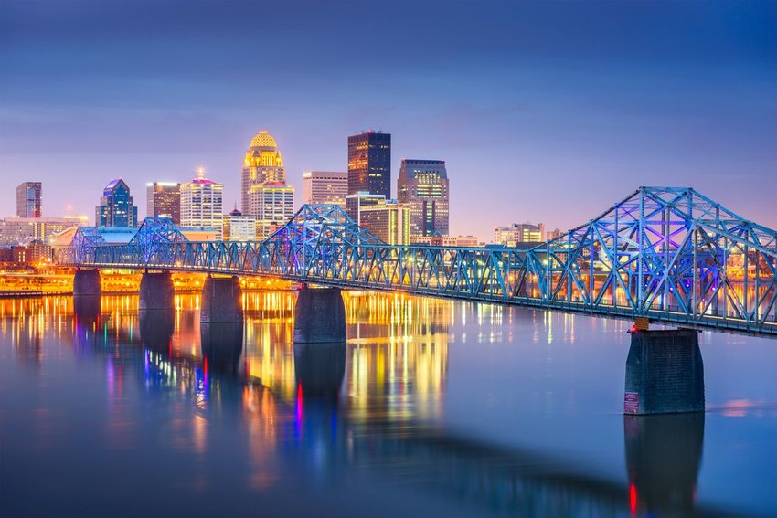 Louisville, Kentucky, USA downtown skyline on the Ohio River at dusk