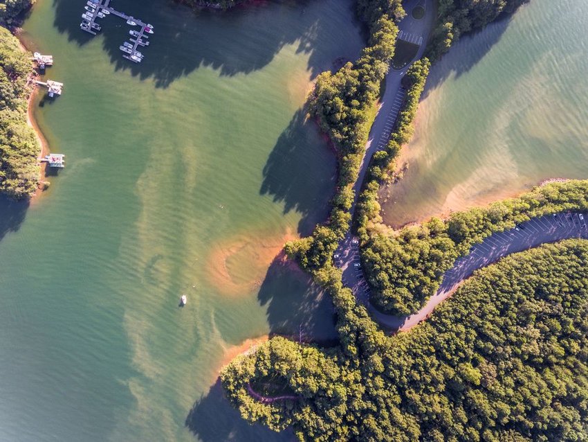 Aerial view of Lake Lanier with road and boats in view