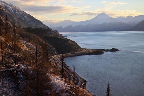 Seward Highway curving around a turn on the coast of Alaska