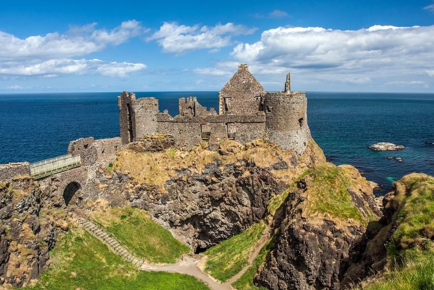 Dunluce Castle, Northern Ireland, at the edge of a cliff
