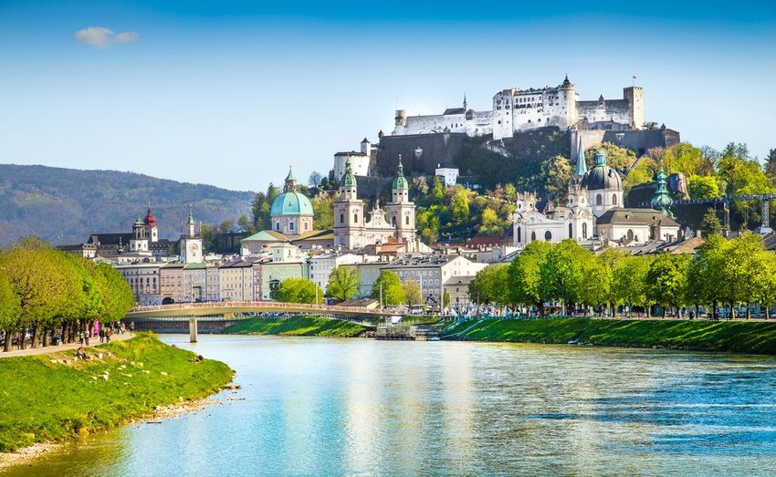 Salzburg skyline with Festung Hohensalzburg and Salzach river in summer