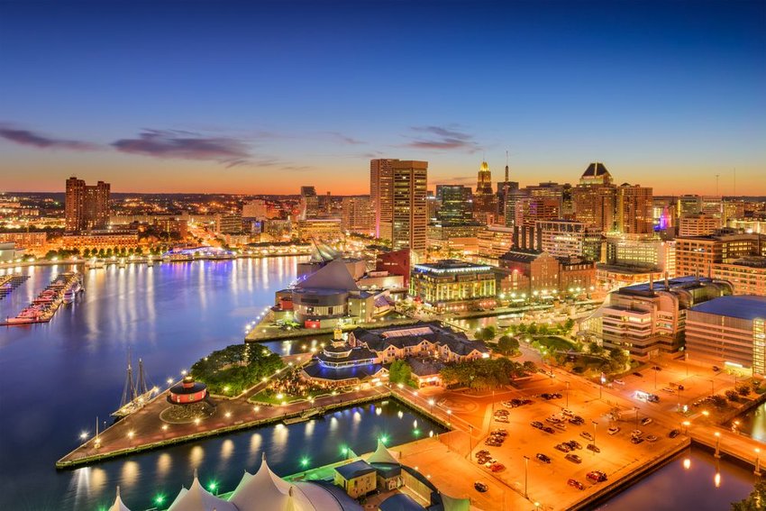 Baltimore, Maryland, USA inner harbor and downtown skyline at twilight