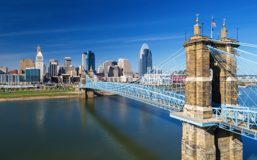 The Roebling Suspension Bridge with Downtown Cincinnati in the background and Ohio River 