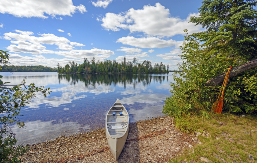 Canoe pulled onto land in Kekekabic Lake in the Boundary Waters