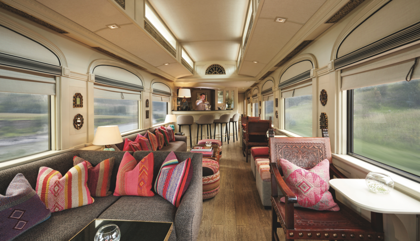 Interior view of train with bar and seating 