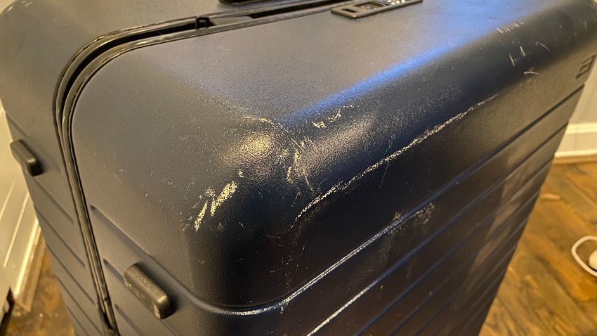 Away store luggage scratches