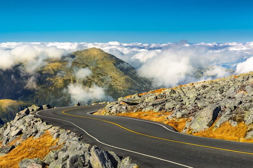 Winding road descending from Mount Washington, NH in White Mountain National Forest