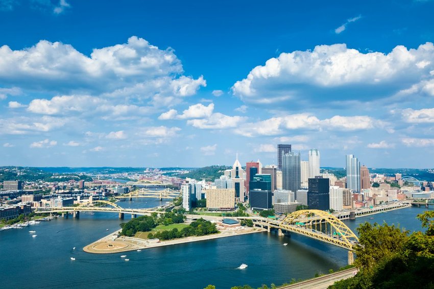 View of Pittsburgh skyscrapers with bridges on all sides 