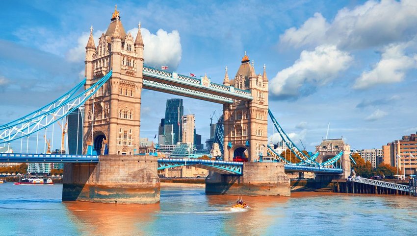 Boat in water under the Tower Bridge in London