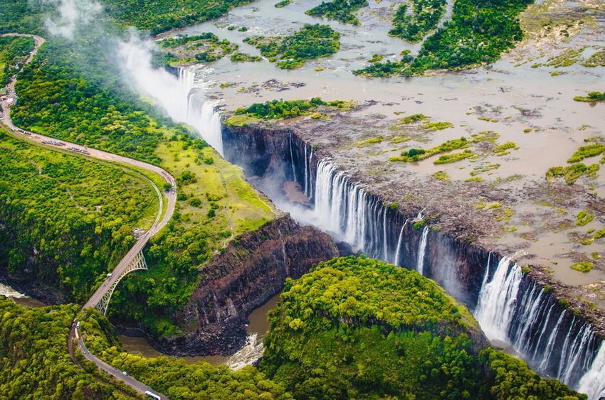 Aerial view of bridge and falls at Victoria Falls