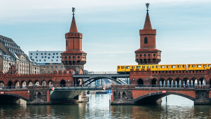 Oberbaum bridge over river with yellow tram crossing over