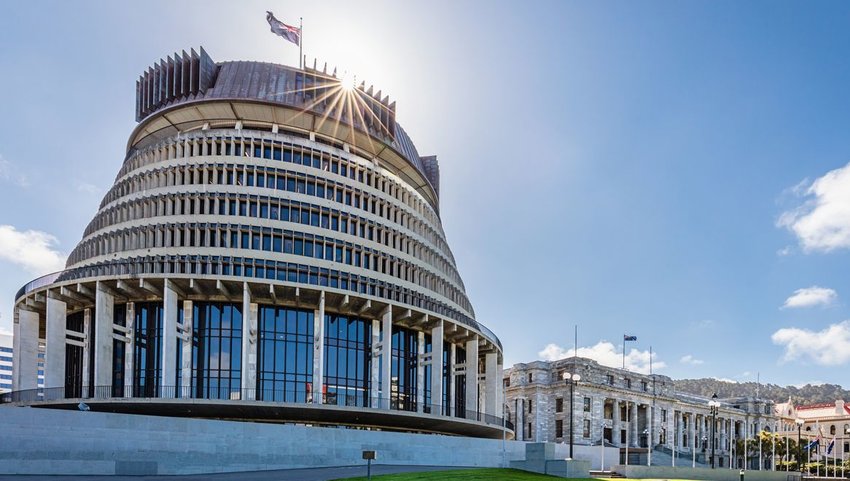 Exterior of the Beehive with New Zealand flag on top of building