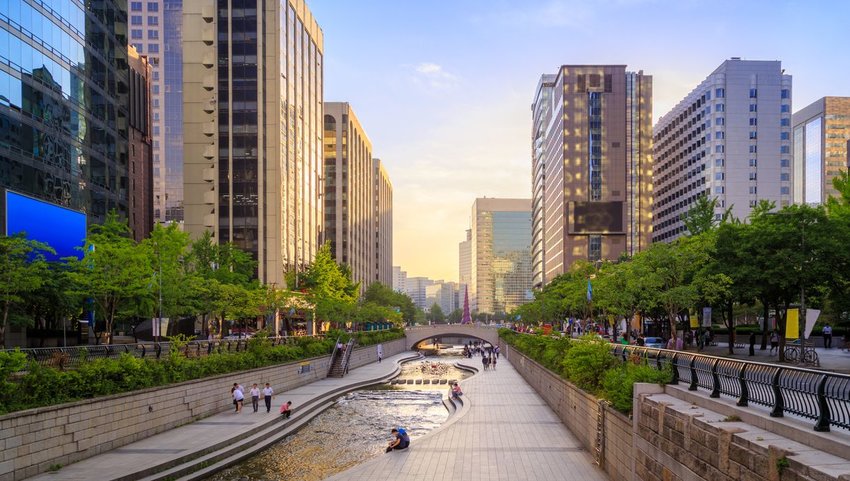 River running through the city at sunset