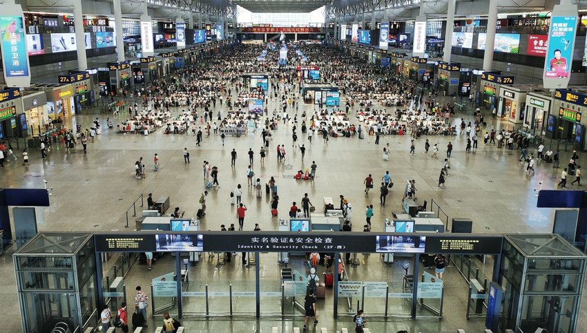 Interior of airport with lots of people