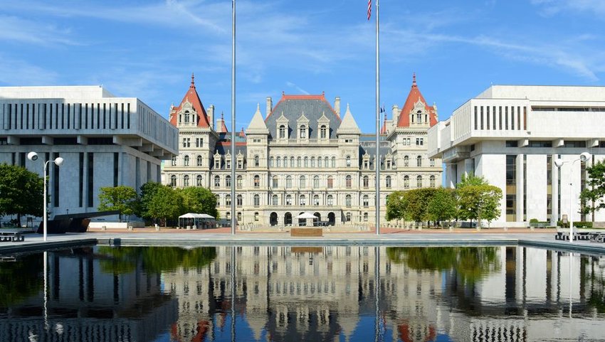 Exterior of New York State Capital Building with water in front 