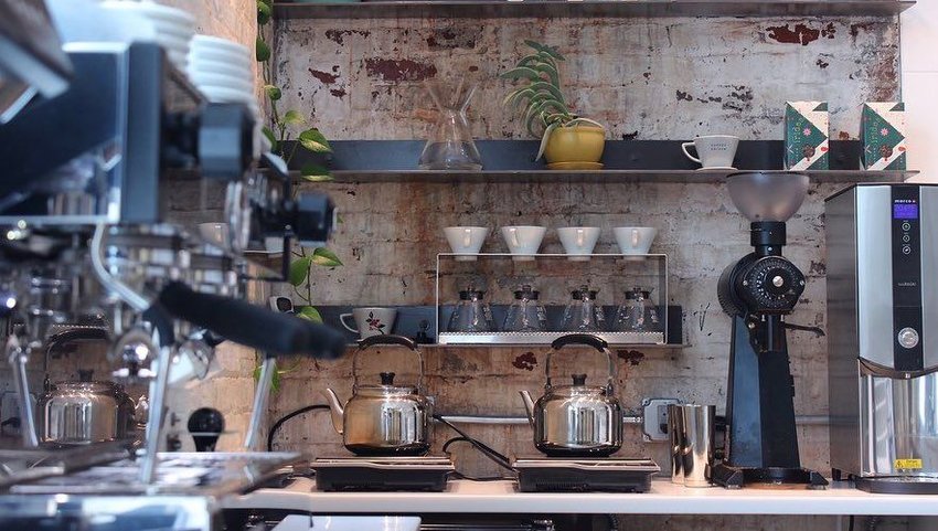 Coffee on counter with coffee mugs